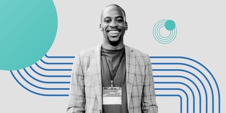 Man wearing event attendee badge with stylized brand elements behind him