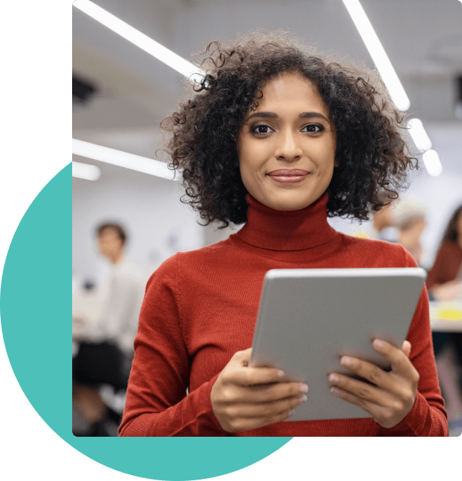 Woman using tablet for membership management with association management software