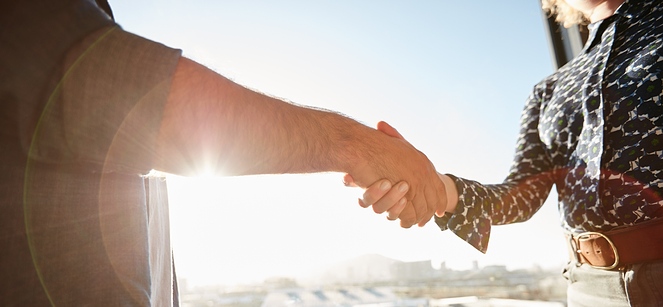 handshake between a man and woman