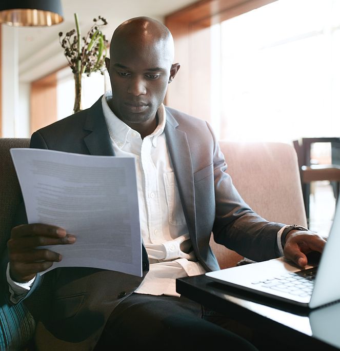 Man looking at paper